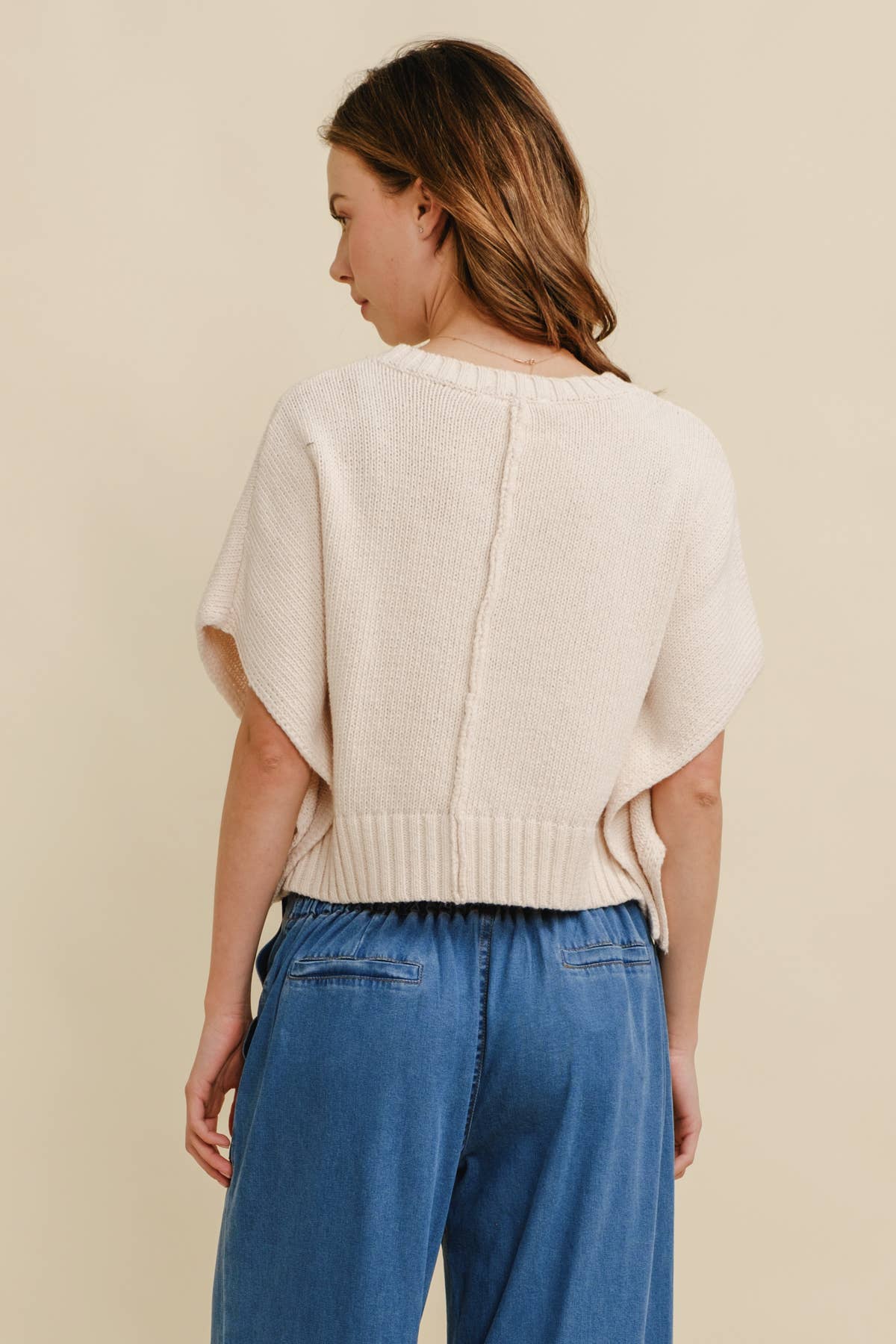 Cropped sleeveless sweater
